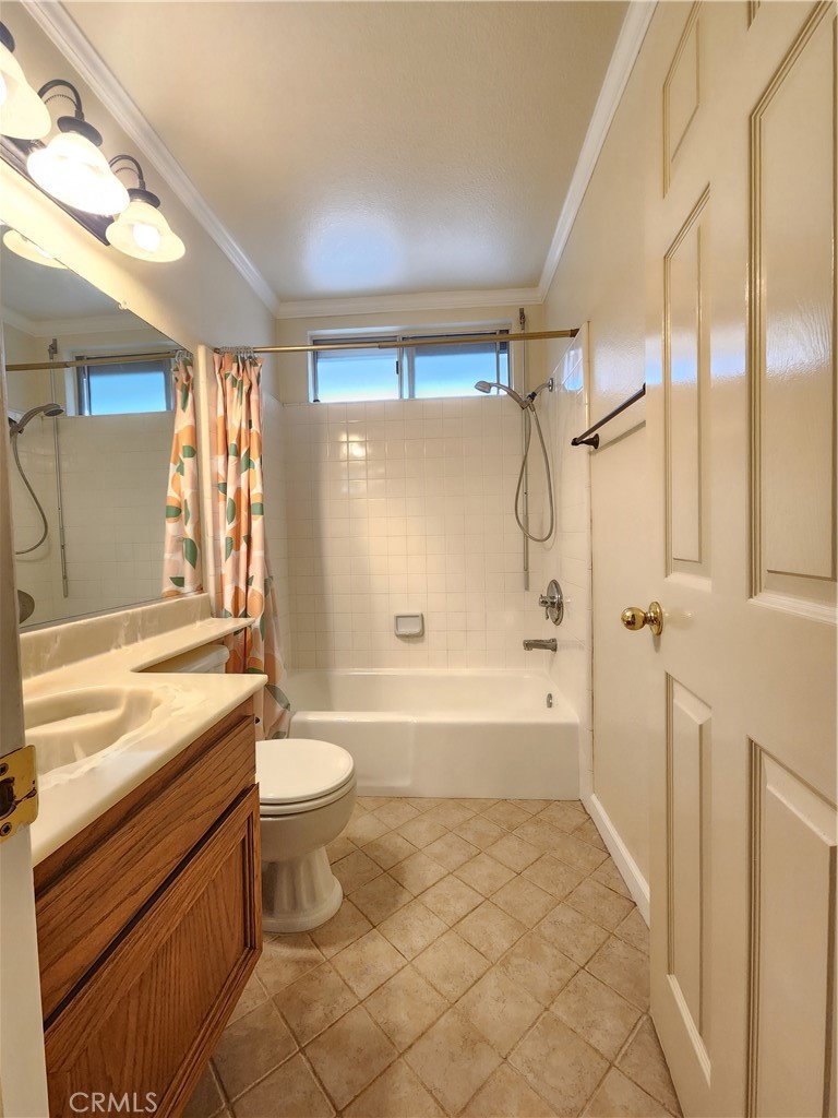 21029 Northview Drive Walnut, CA 91789 - Photo 19 of 22 a bathroom with a granite countertop sink toilet and shower