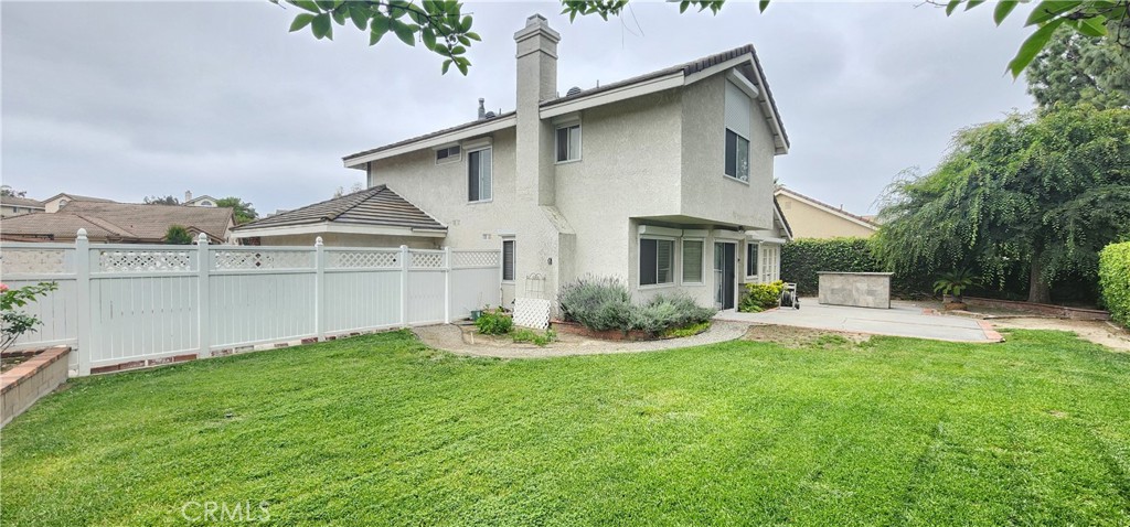 21029 Northview Drive Walnut, CA 91789 - Photo 22 of 22 a front view of a house with a yard and lake view
