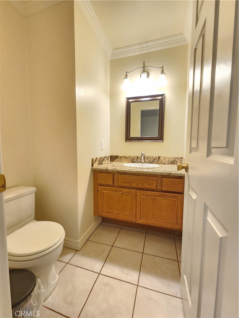 21029 Northview Drive Walnut, CA 91789 - Photo 10 of 22 a bathroom with a sink a toilet and mirror