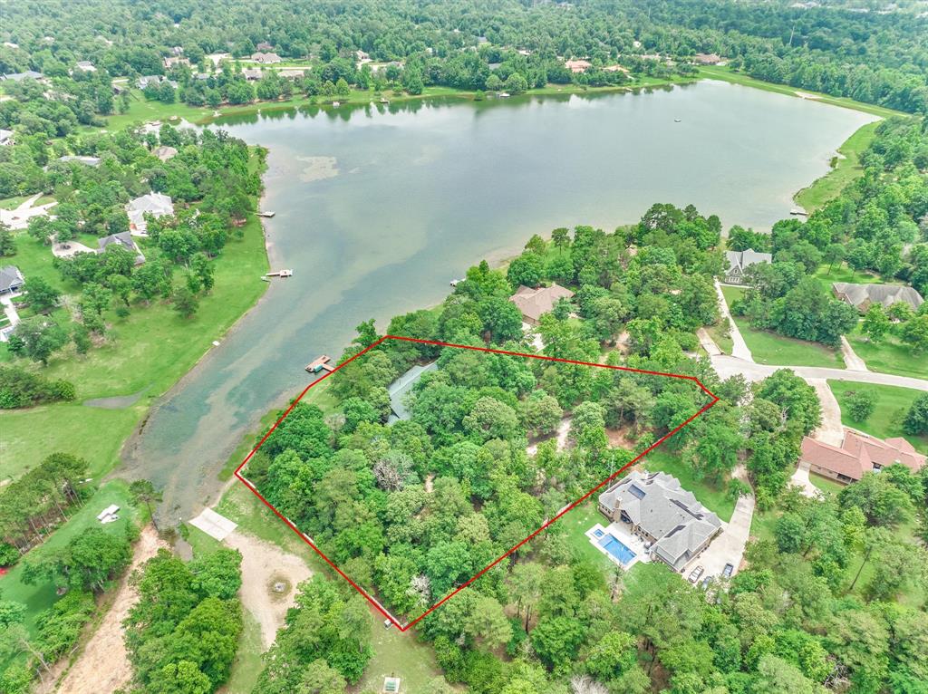 Savor 238' lakefront property in this custom 1-story in sought-after Ridgelake Shores!