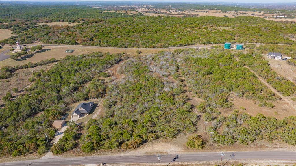 2280 Compass Way Bluff Dale, TX 76433 - Photo 2 of 40 an aerial view of residential houses with outdoor space