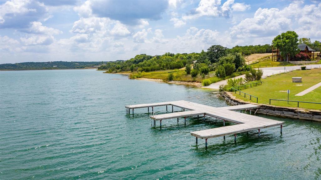 2280 Compass Way Bluff Dale, TX 76433 - Photo 22 of 40 a view of a lake with outdoor space