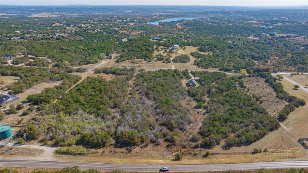 2280 Compass Way Bluff Dale, TX 76433 - Photo 3 of 40 an aerial view of residential houses with outdoor space and trees