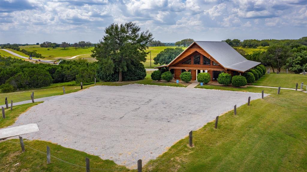 2280 Compass Way Bluff Dale, TX 76433 - Photo 31 of 40 a front view of house with yard and green space