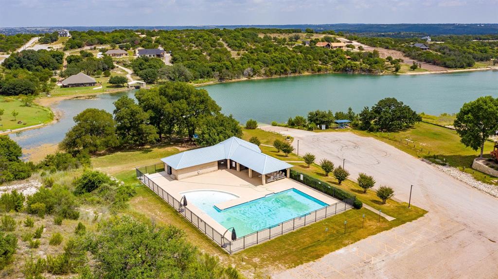 2280 Compass Way Bluff Dale, TX 76433 - Photo 39 of 40 an aerial view of a house with a lake view