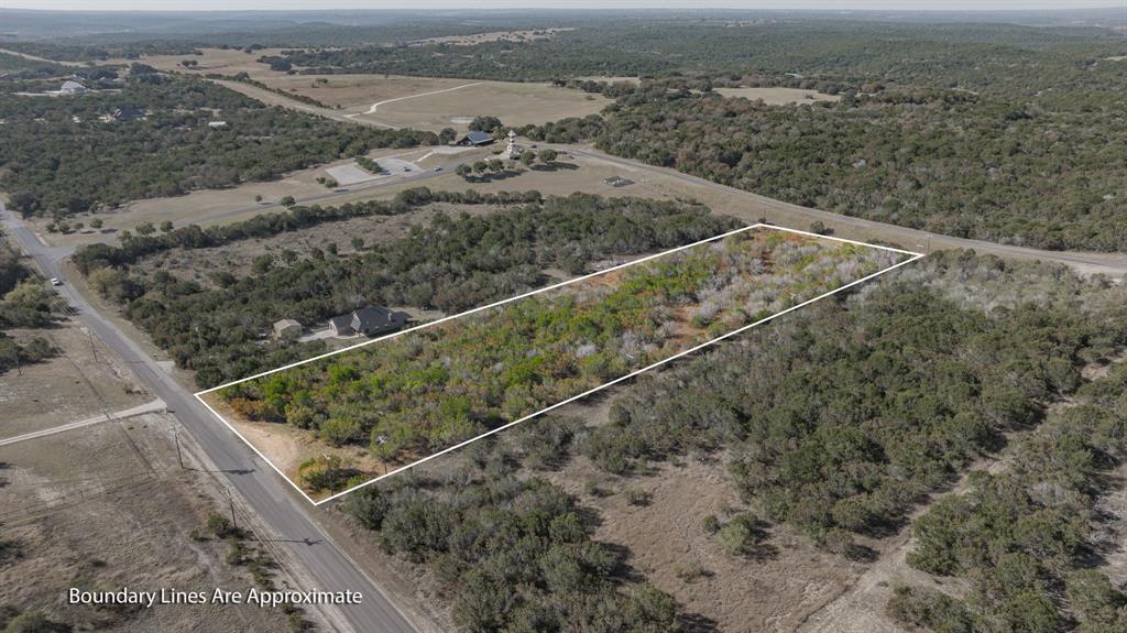 2280 Compass Way Bluff Dale, TX 76433 - Photo 5 of 40 a view of a outdoor space with a lake view