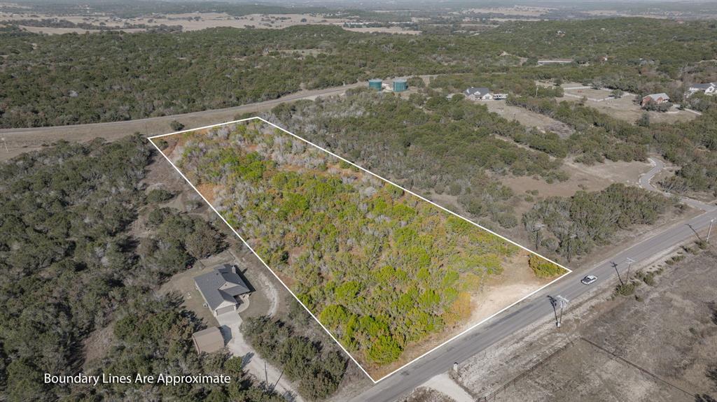 2280 Compass Way Bluff Dale, TX 76433 - Photo 6 of 40 a view of a small yard