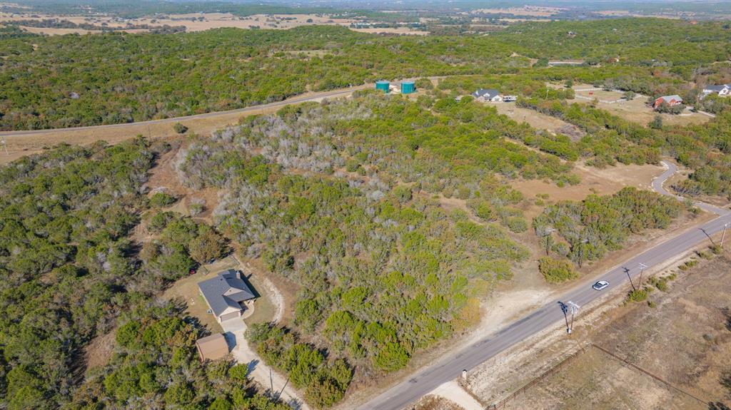 2280 Compass Way Bluff Dale, TX 76433 - Photo 8 of 40 a view of a lake with a mountain