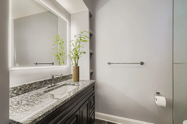 a bathroom with a shower and a toilet