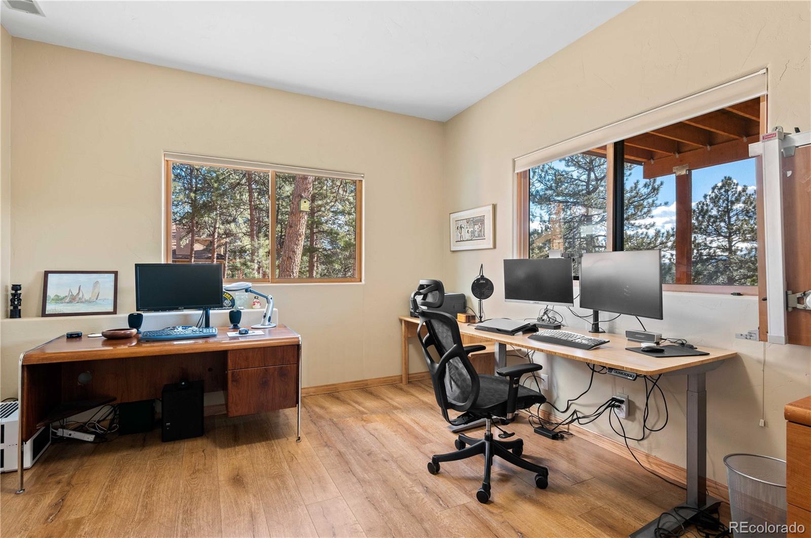 30754 Stratton Court Evergreen, CO 80439 - Photo 28 of 40 a view of a workspace with furniture and a window