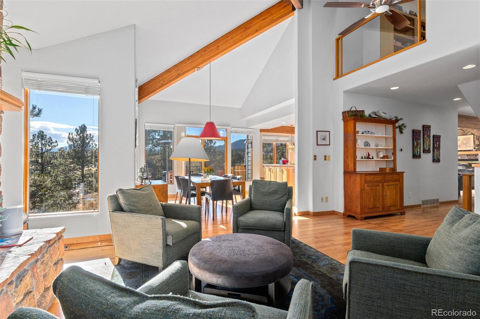 30754 Stratton Court Evergreen, CO 80439 - Photo 7 of 40 a living room with furniture and a large window