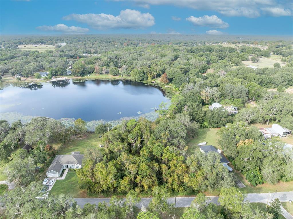 Royal Oak Road Fruitland Park, FL 34731 - Photo 7 of 26 a view of a lake with a yard