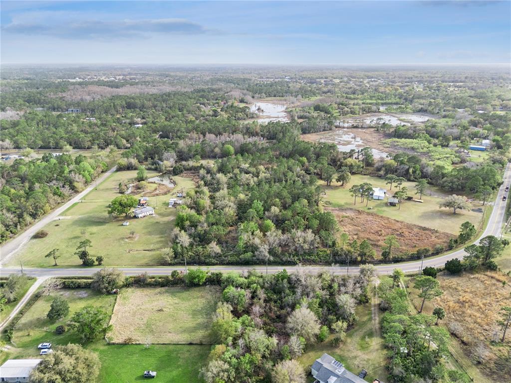 541 East Osceola Road Geneva, FL 32732 - Photo 12 of 31 an aerial view of residential houses with outdoor space