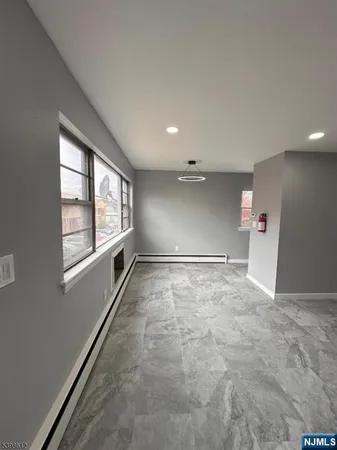 en empty room with windows