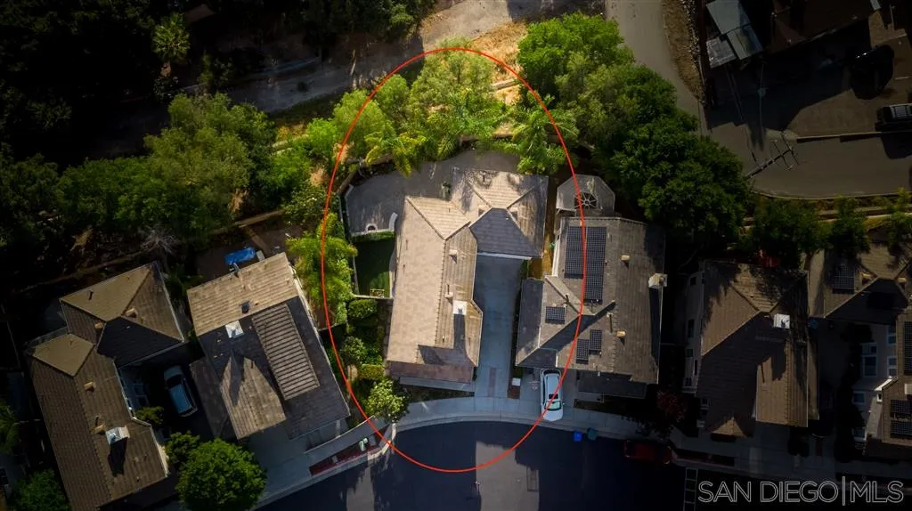 12236 Pepper Tree Lane Poway, CA 92064 - Photo 2 of 6 a backyard of a house with lots of green space