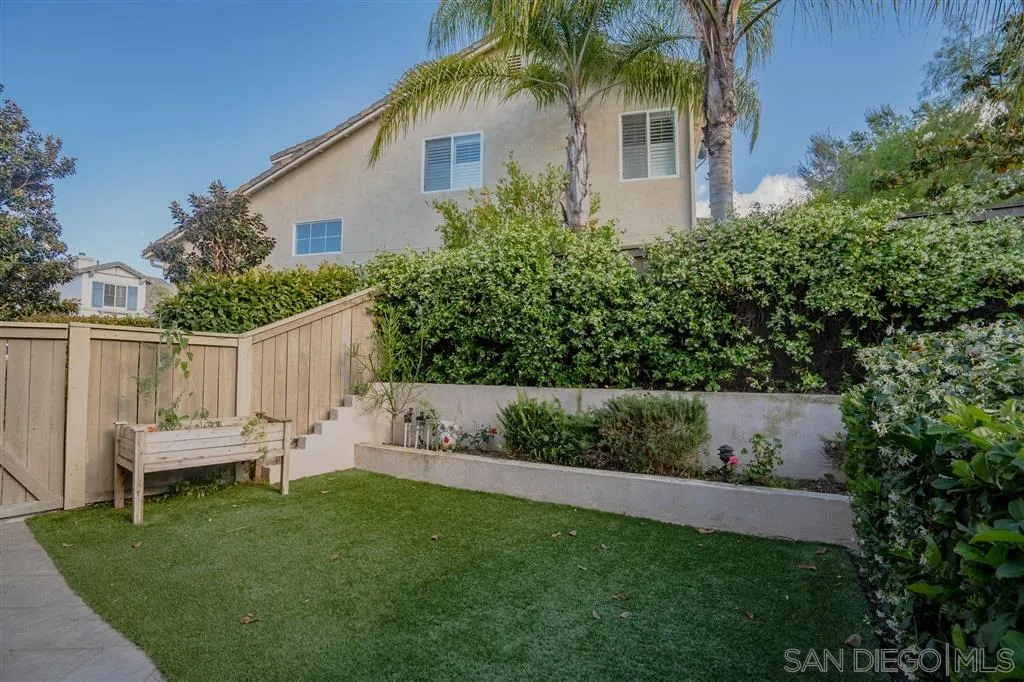 12236 Pepper Tree Lane Poway, CA 92064 - Photo 5 of 6 a view of house with backyard and garden