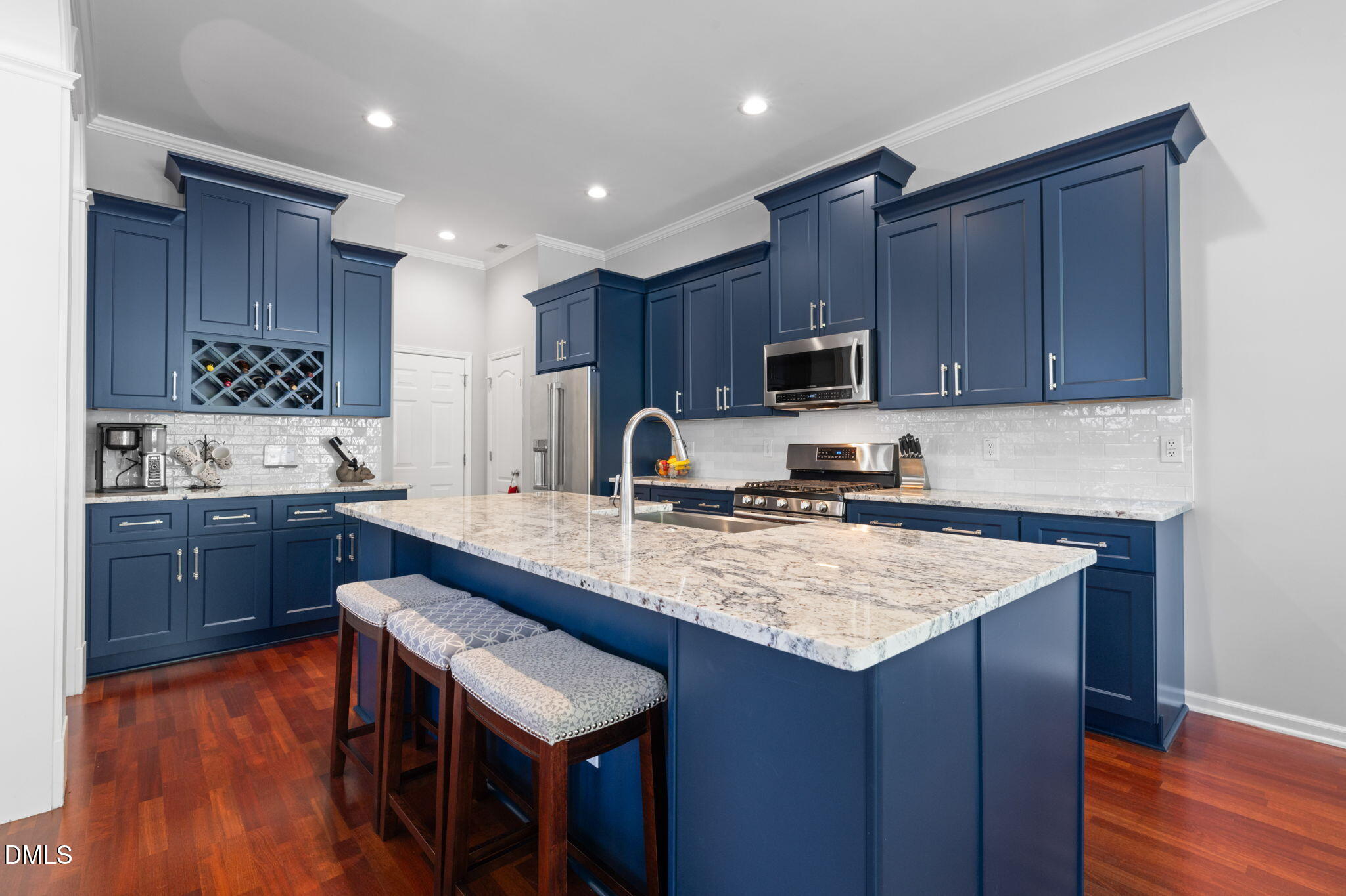 13227 Ashford Park Drive Raleigh, NC 27613 - Photo 13 of 55 a kitchen with a sink stove top oven and cabinets