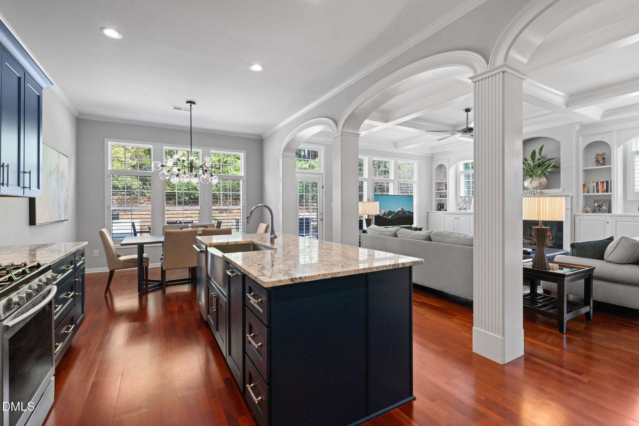 13227 Ashford Park Drive Raleigh, NC 27613 - Photo 16 of 55 a kitchen with stainless steel appliances granite countertop a stove and a wooden floors