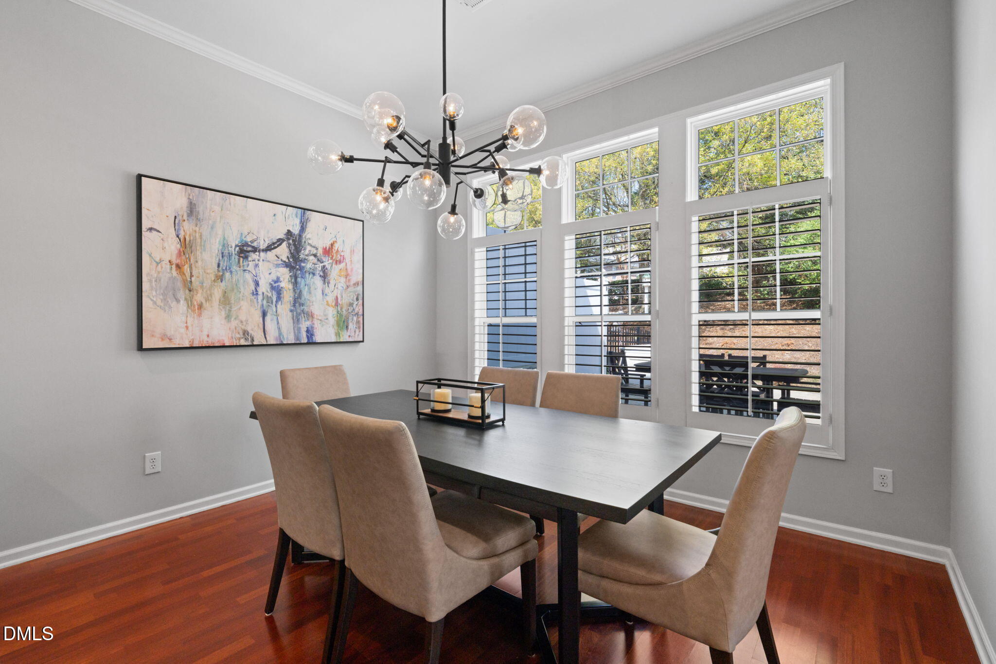 13227 Ashford Park Drive Raleigh, NC 27613 - Photo 17 of 55 a view of a dining room with furniture window and wooden floor
