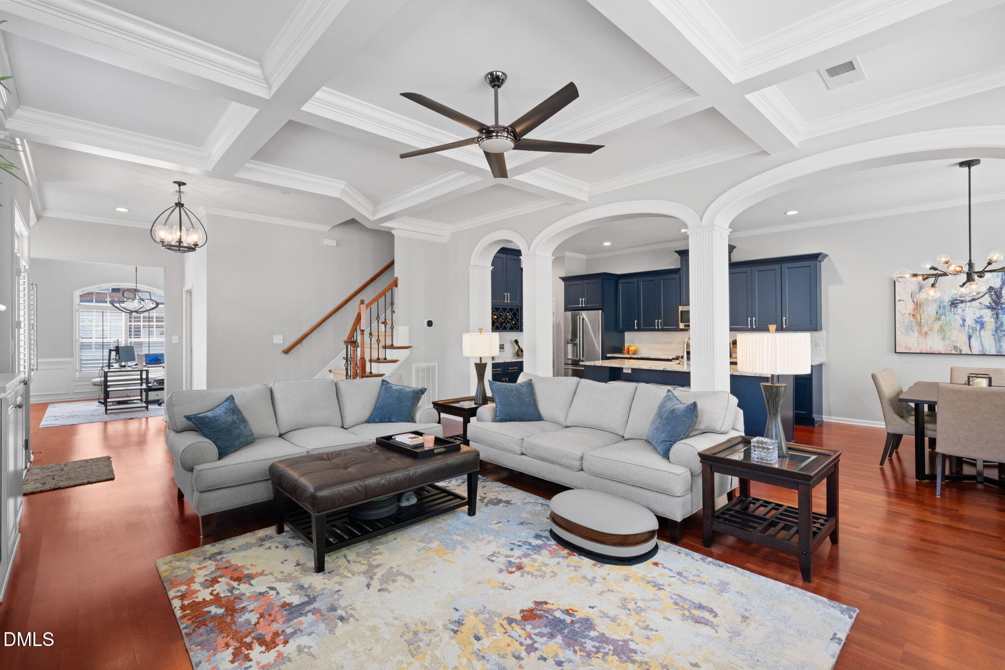 13227 Ashford Park Drive Raleigh, NC 27613 - Photo 2 of 55 a living room with furniture a rug and a chandelier