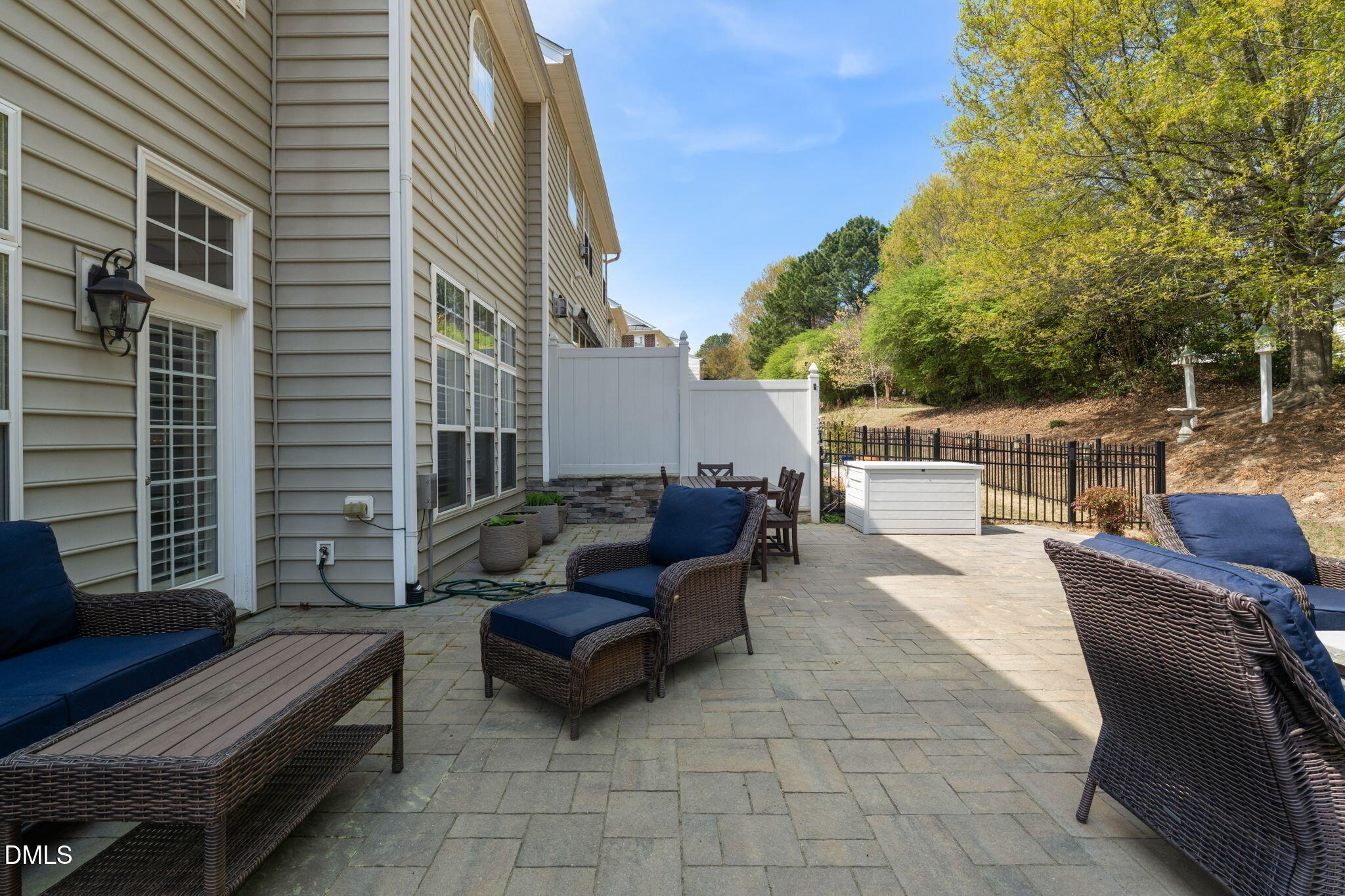13227 Ashford Park Drive Raleigh, NC 27613 - Photo 38 of 55 a view of a patio with couches and potted plants