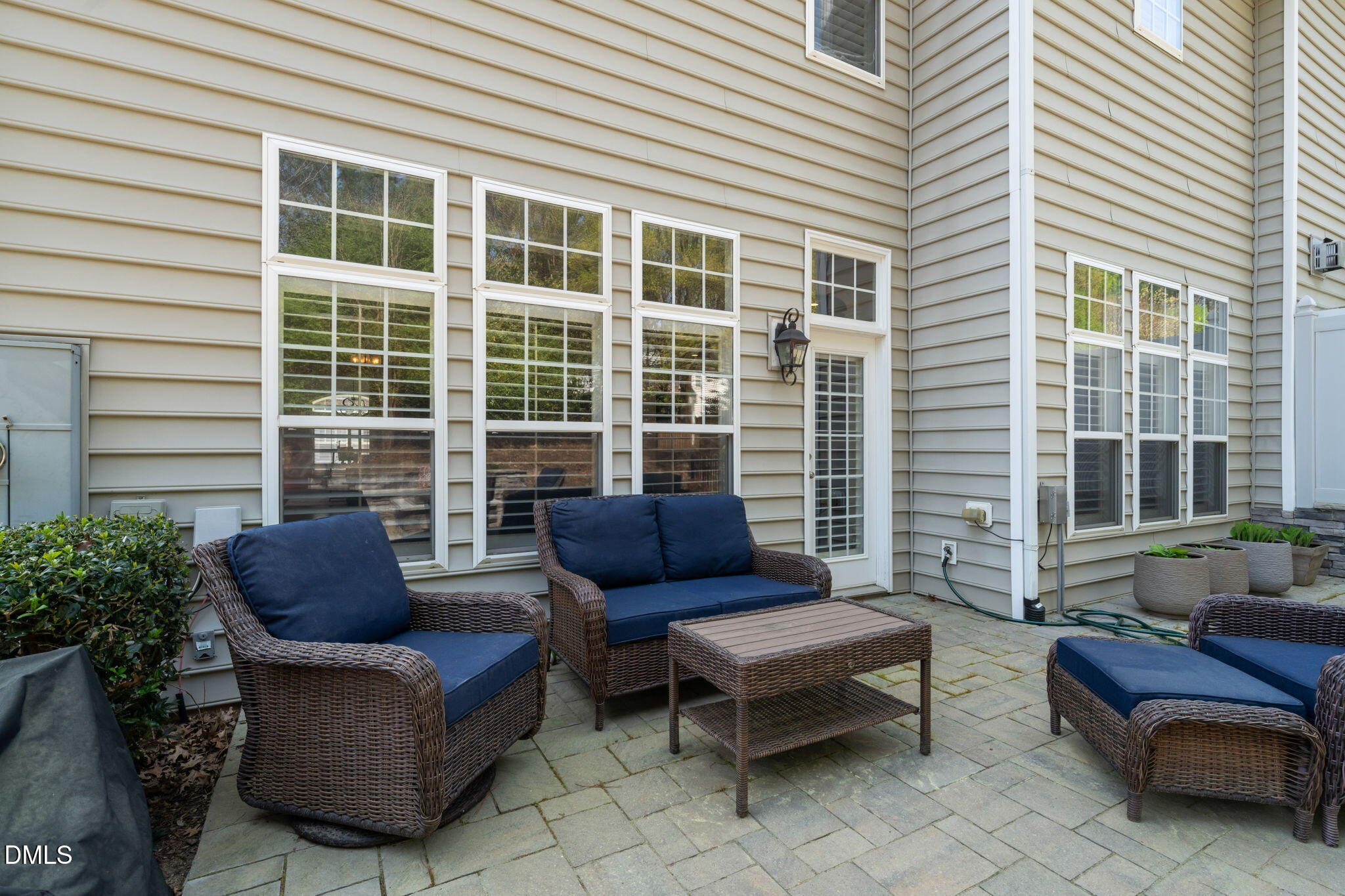13227 Ashford Park Drive Raleigh, NC 27613 - Photo 39 of 55 a view of a patio with couches and a potted plant