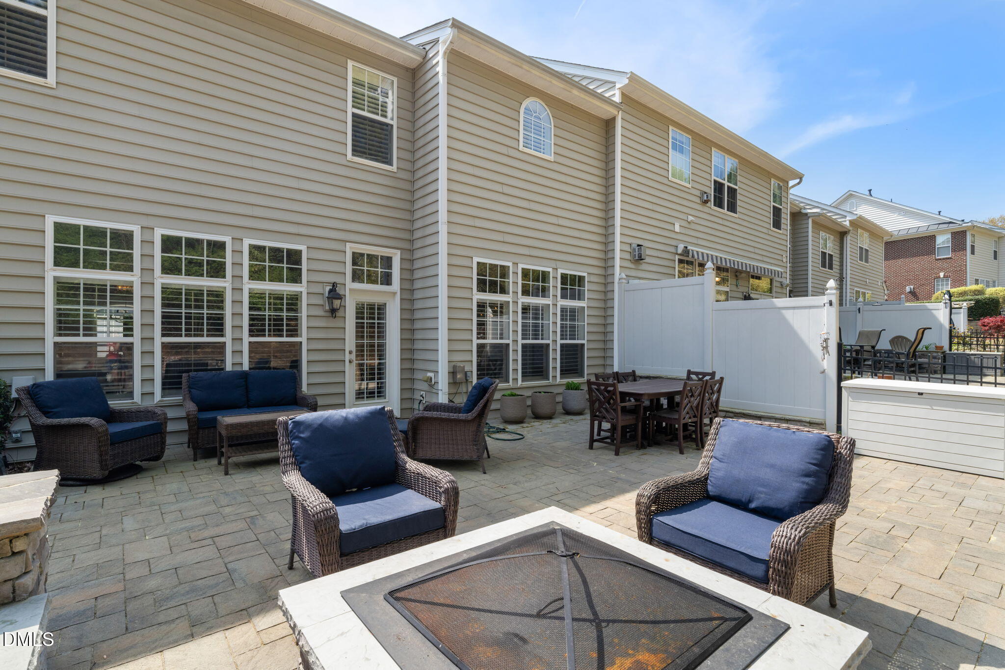 13227 Ashford Park Drive Raleigh, NC 27613 - Photo 43 of 55 a view of a patio with couches and a potted plant on a table