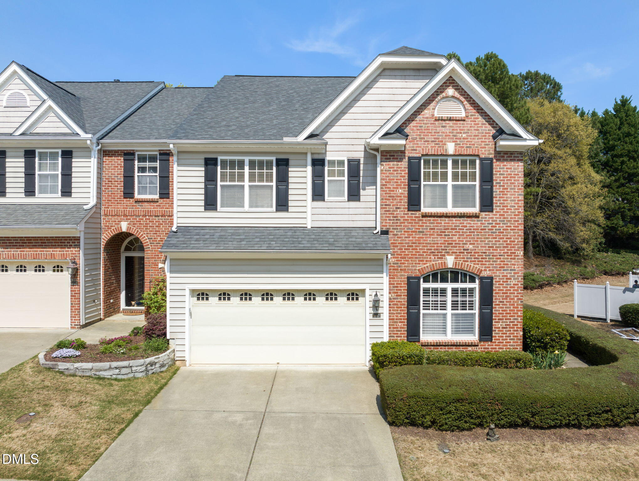 13227 Ashford Park Drive Raleigh, NC 27613 - Photo 51 of 55 a front view of a house with a yard and garage