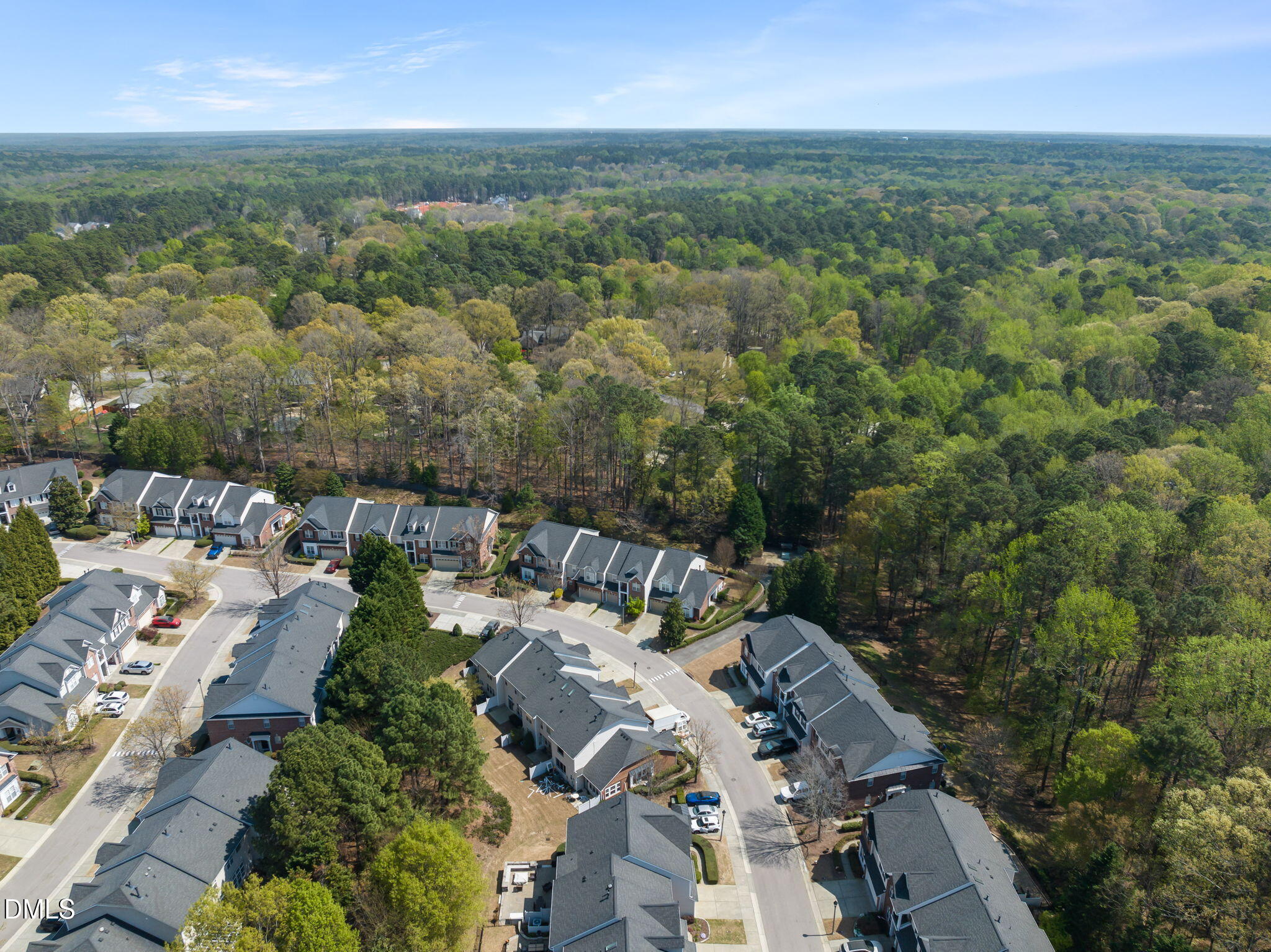 13227 Ashford Park Drive Raleigh, NC 27613 - Photo 52 of 55 an aerial view of a city with lots of residential buildings