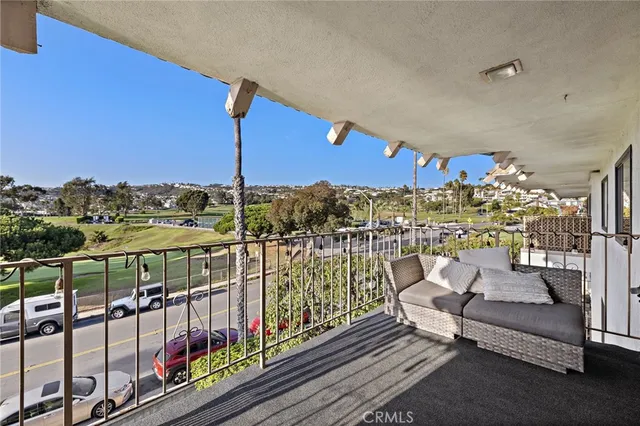 a view of balcony with chairs