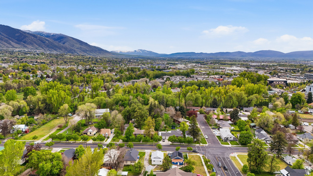 215 East 300 South Logan, UT 84321 - Photo 29 of 32 Aerial perspective of suburban area with a mountainous background