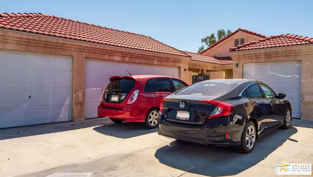 a car parked in front of a house