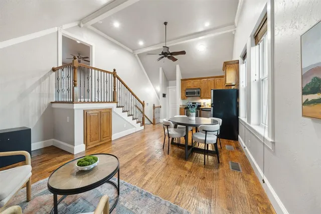 a view of a livingroom with furniture and a table