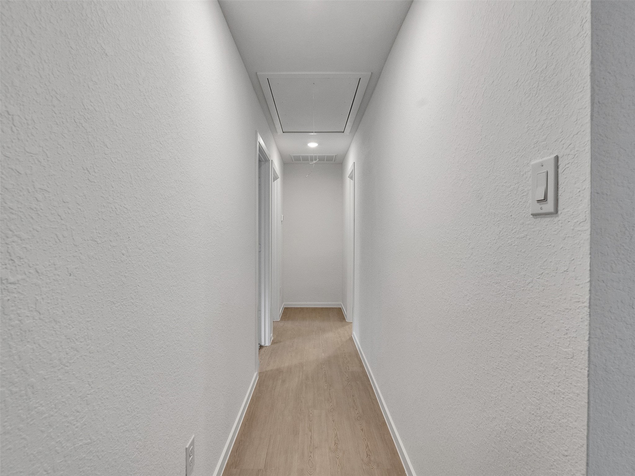 17974 Valle Cupa Lane New Caney, TX 77357 - Photo 18 of 36 a view of a hallway