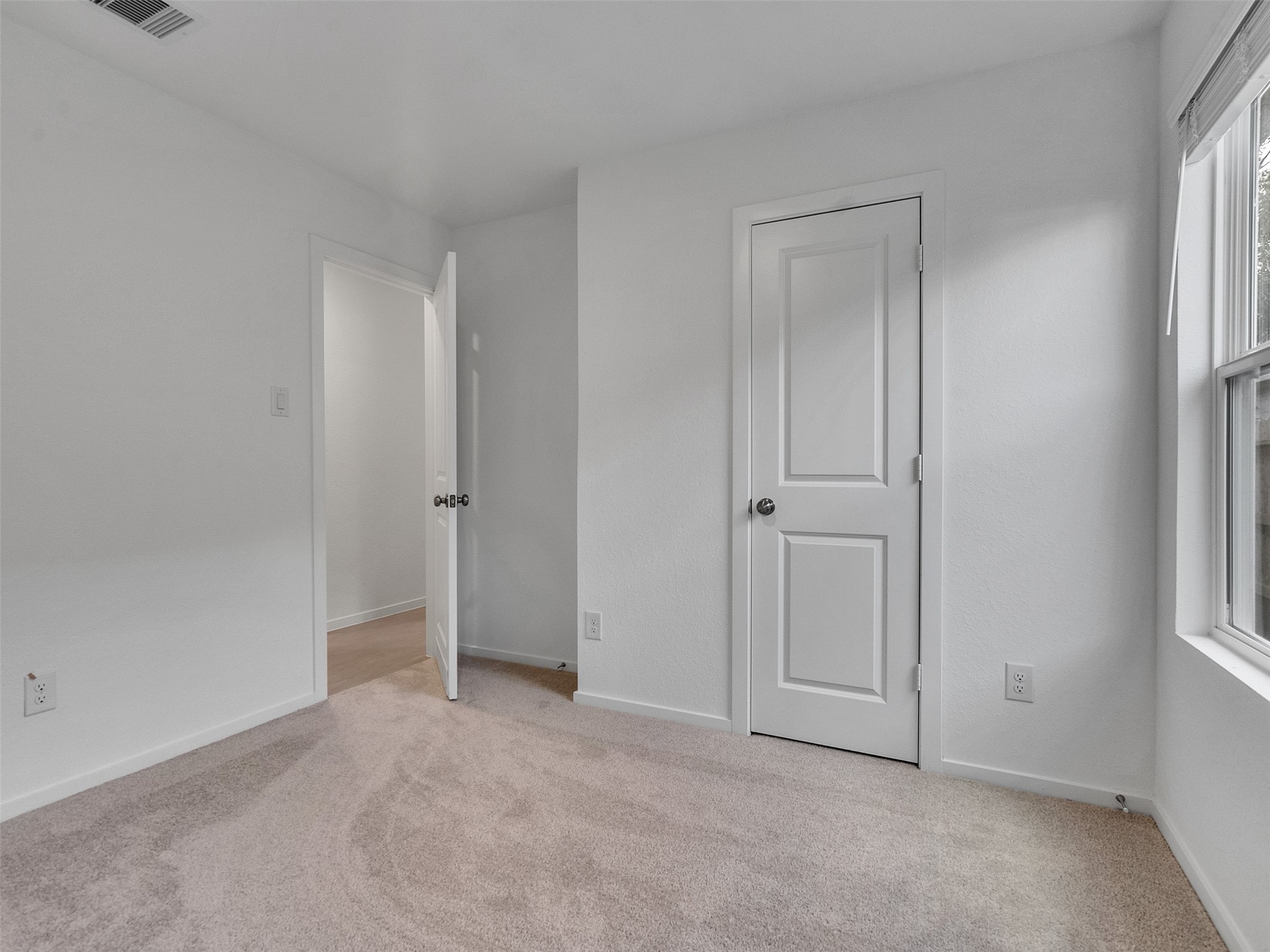 17974 Valle Cupa Lane New Caney, TX 77357 - Photo 20 of 36 a view of an empty room and window