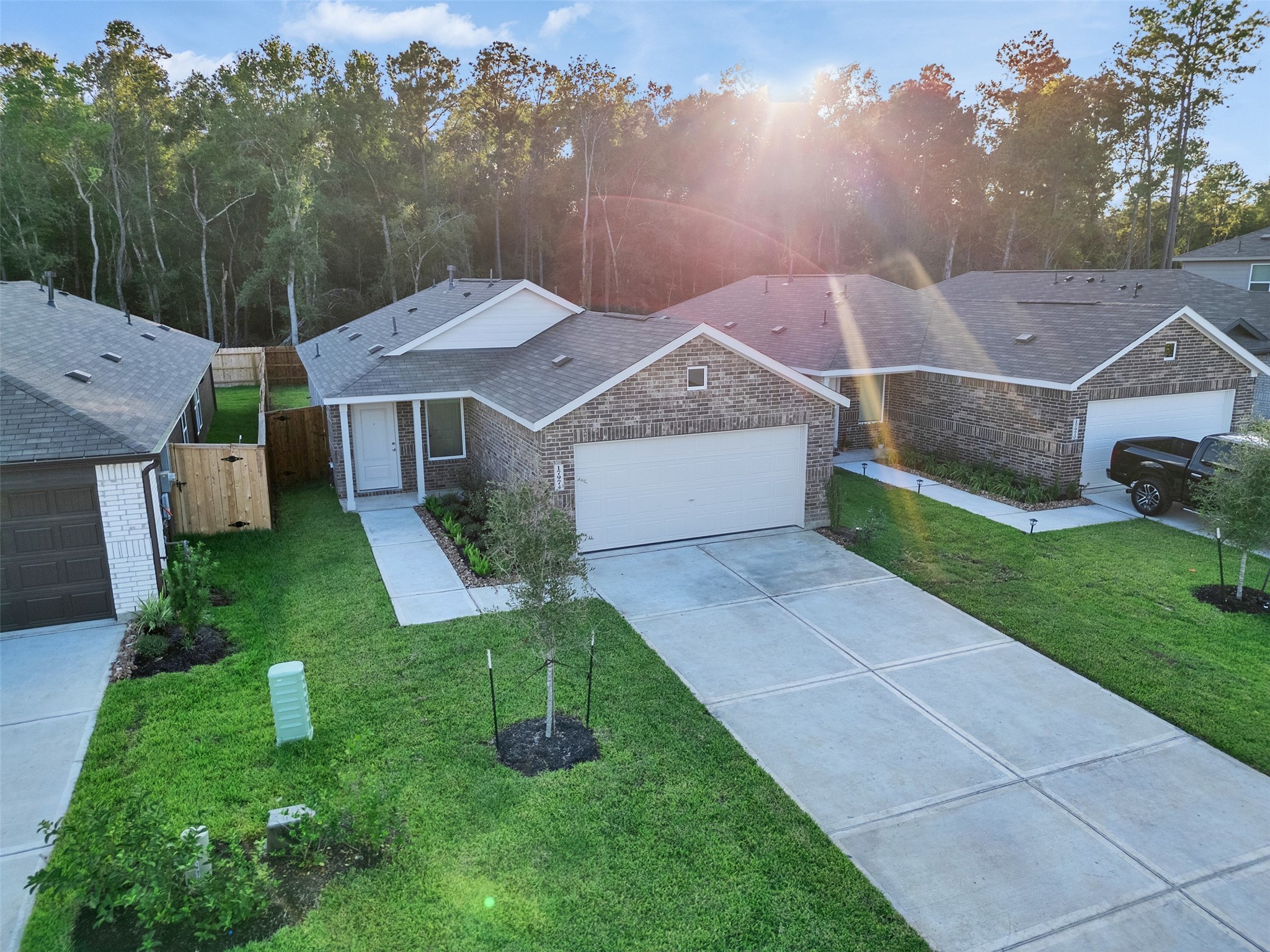 17974 Valle Cupa Lane New Caney, TX 77357 - Photo 2 of 36 a front view of a house with a yard