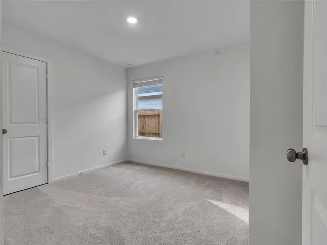 a view of a backyard with palm tree