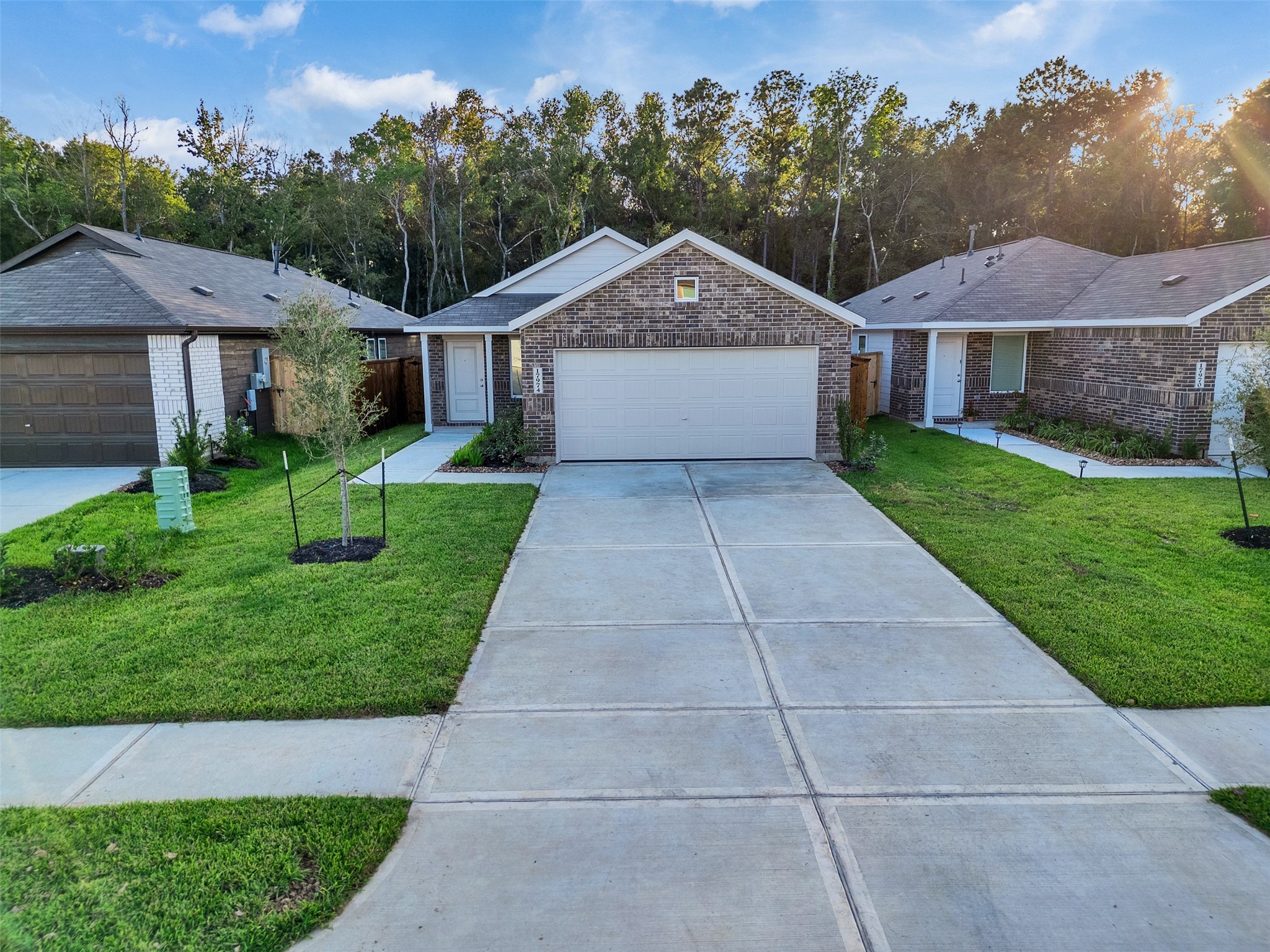 17974 Valle Cupa Lane New Caney, TX 77357 - Photo 3 of 36 a front view of a house with a yard