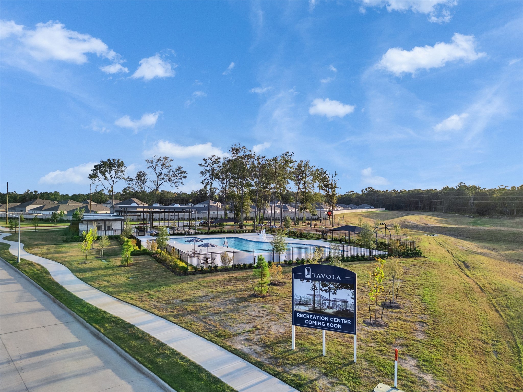 17974 Valle Cupa Lane New Caney, TX 77357 - Photo 33 of 36 a view of a lake with a nearby beach