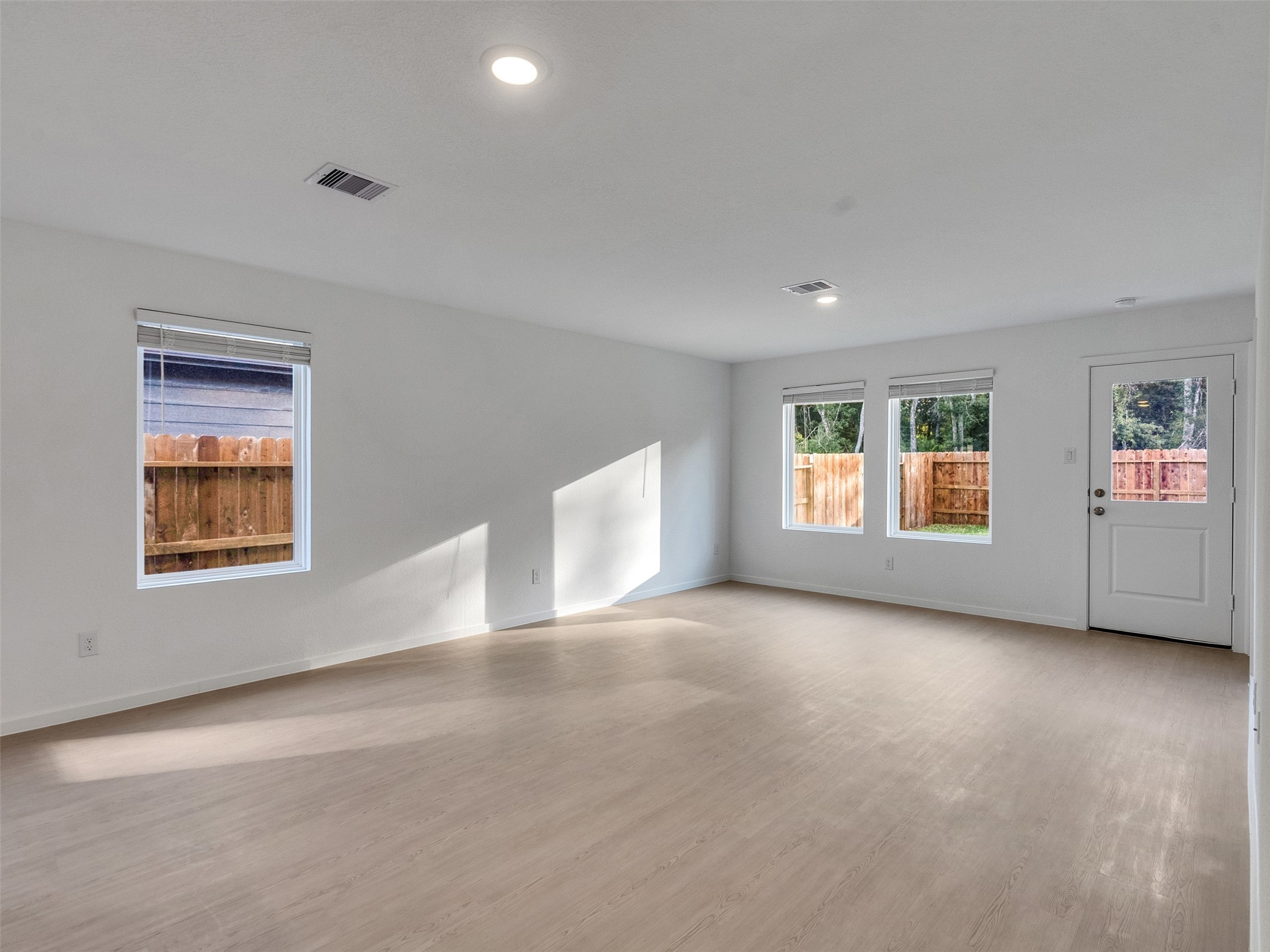 17974 Valle Cupa Lane New Caney, TX 77357 - Photo 10 of 36 a view of an empty room with window