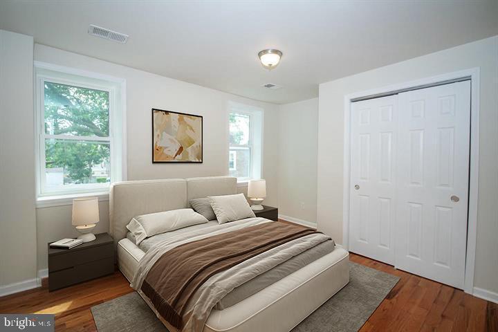 114 Brookfield Terrace Ardmore, PA 19003 - Photo 8 of 13 a bedroom with a large bed and a window
