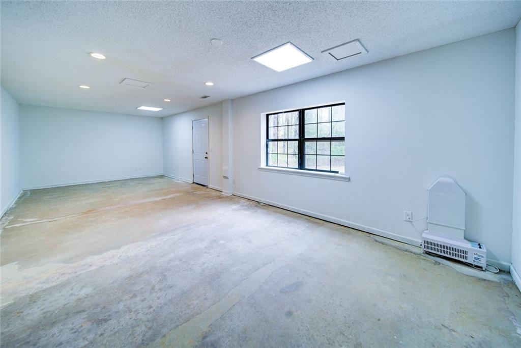2976 Sweetwater Juno Road Dawsonville, GA 30534 - Photo 30 of 42 an empty room with windows