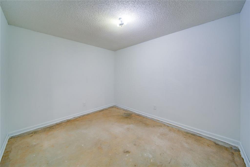 2976 Sweetwater Juno Road Dawsonville, GA 30534 - Photo 33 of 42 a view of an empty room