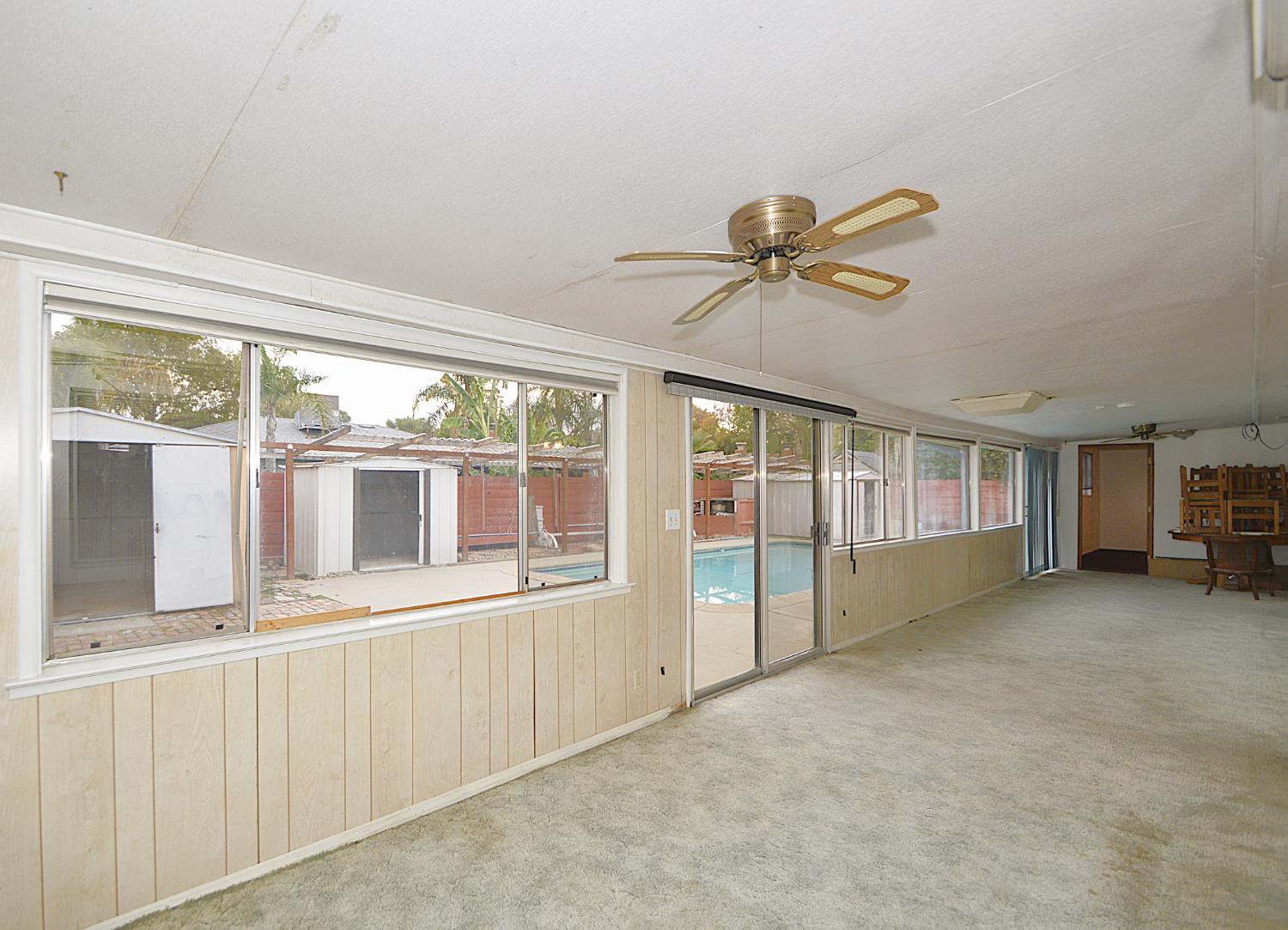 3860 East Rialto Avenue Fresno, CA 93726 - Photo 7 of 8 a view of an empty room with a window
