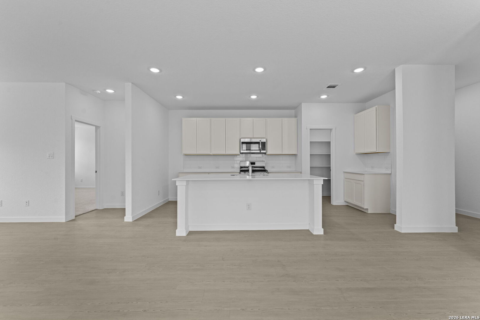 2323 Fort Davis Pass Marion, TX 78124 - Photo 18 of 30 a view of kitchen with kitchen island white cabinets and stainless steel appliances
