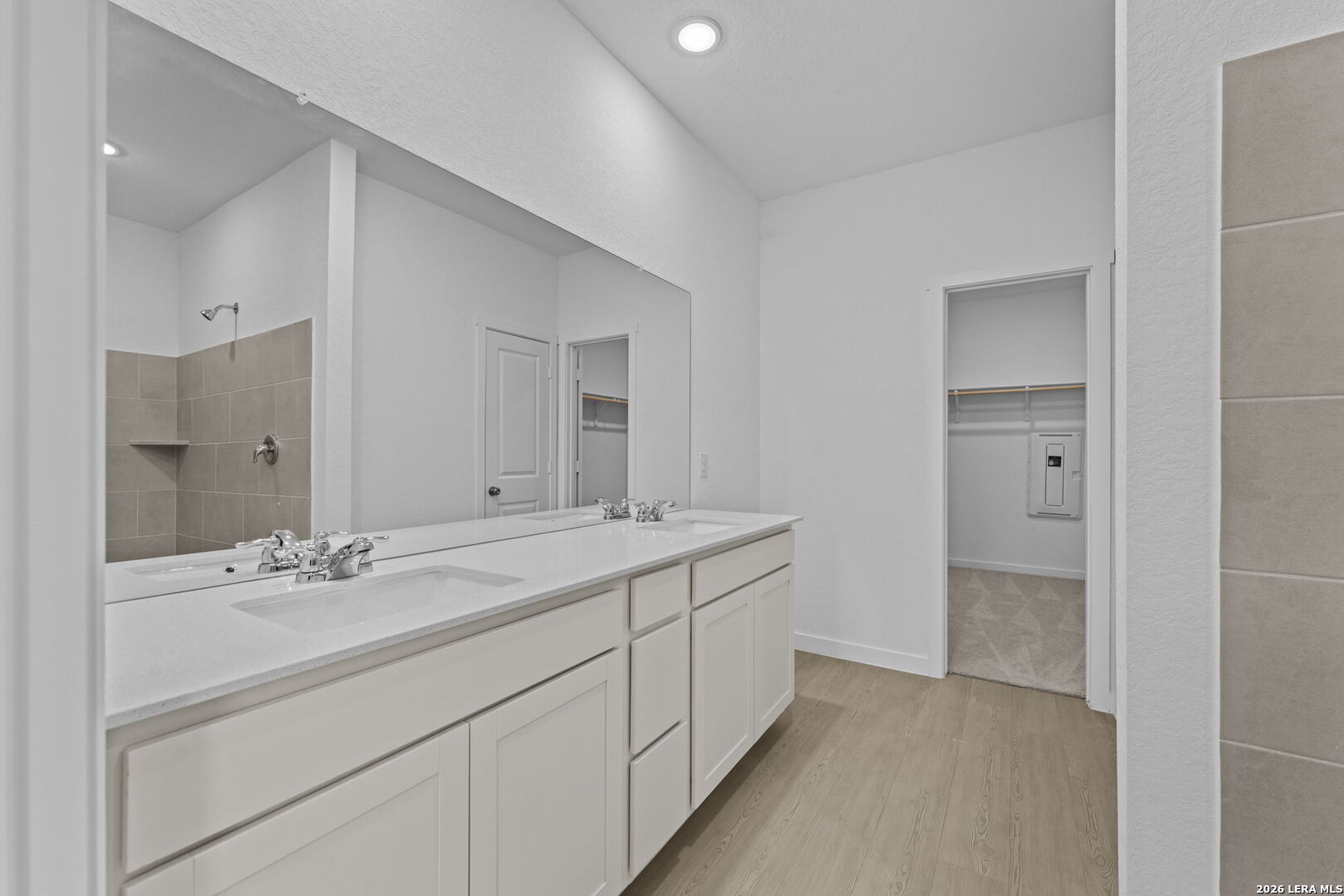 2323 Fort Davis Pass Marion, TX 78124 - Photo 27 of 30 a bathroom with a sink double vanity and a mirror