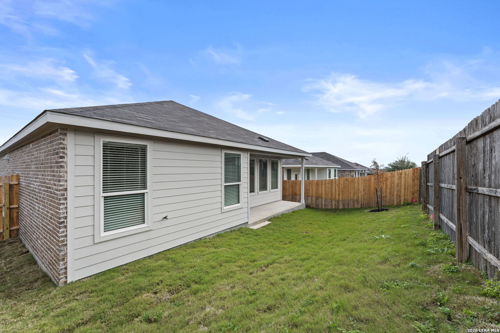 2323 Fort Davis Pass Marion, TX 78124 - Photo 29 of 30 a backyard of a house with wooden fence