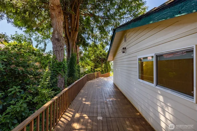 a small pool with a trees in front of it
