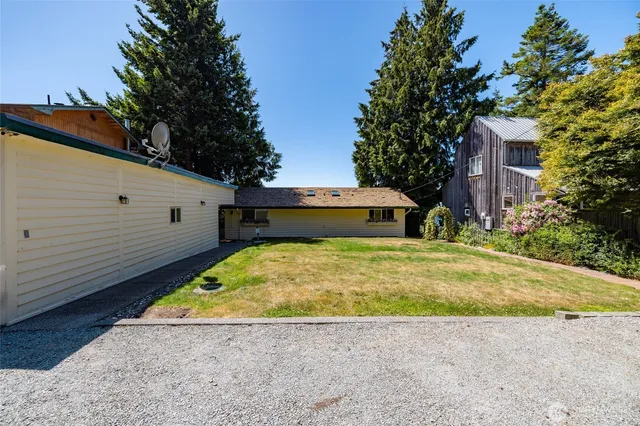 a view of a backyard with a garden