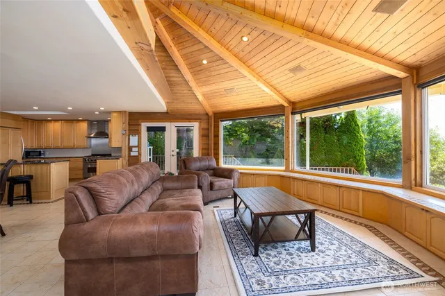 a view of workspace with furniture and a window